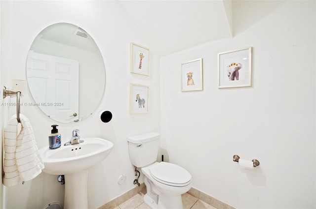 4641 Caspian Way, Davie, FL 33314 - half bathroom featuring toilet, tile patterned flooring, and baseboards
