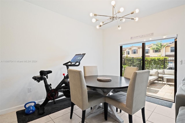 tiled dining room featuring a notable chandelier