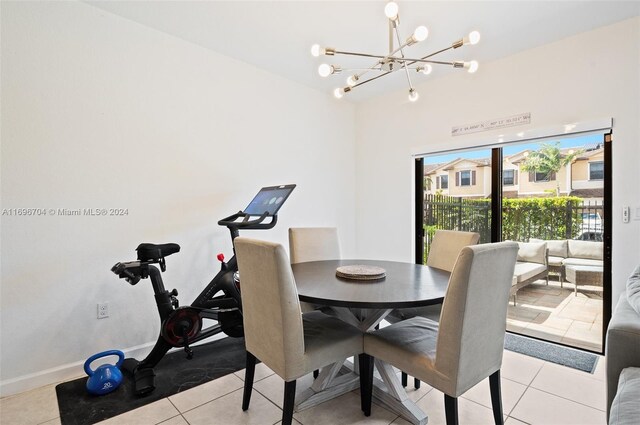 4641 Caspian Way, Davie, FL 33314 - dining space featuring a chandelier, light tile patterned flooring, and baseboards