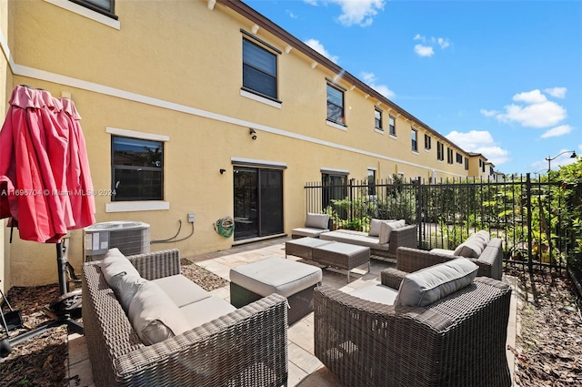 view of patio / terrace featuring central air condition unit and an outdoor hangout area