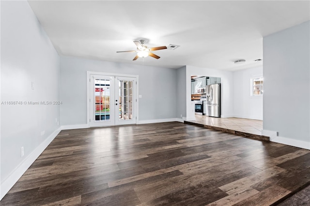 unfurnished living room with wood-type flooring, french doors, and ceiling fan