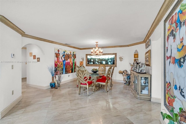 dining room featuring crown molding and a notable chandelier