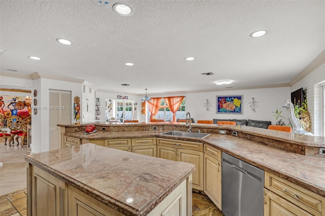 kitchen featuring stainless steel dishwasher, a textured ceiling, crown molding, sink, and a kitchen island