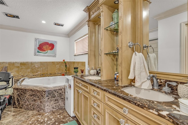 bathroom featuring vanity, crown molding, a textured ceiling, and tiled tub