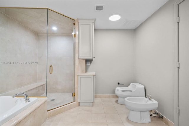 bathroom featuring separate shower and tub, tile patterned flooring, a bidet, and toilet