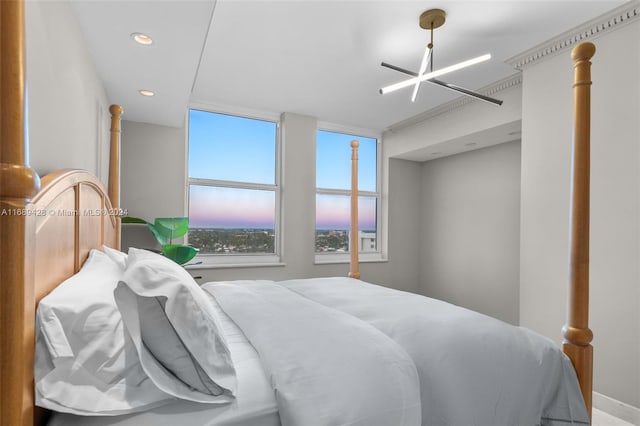 bedroom with a chandelier