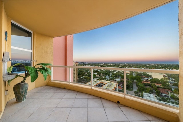 view of balcony at dusk