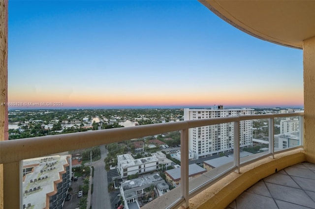 view of balcony at dusk