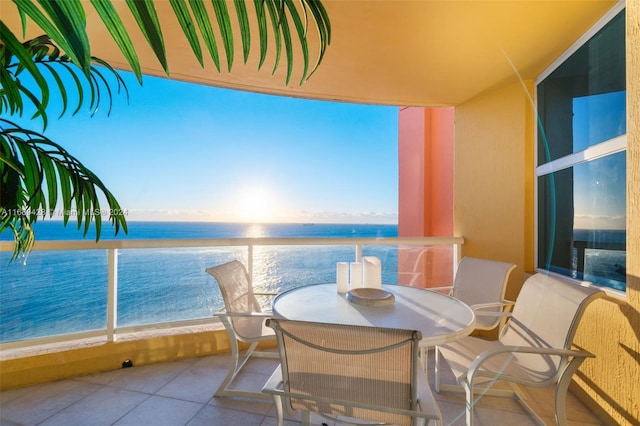 balcony with a view of the beach and a water view