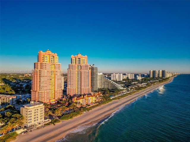 bird's eye view with a view of the beach and a water view