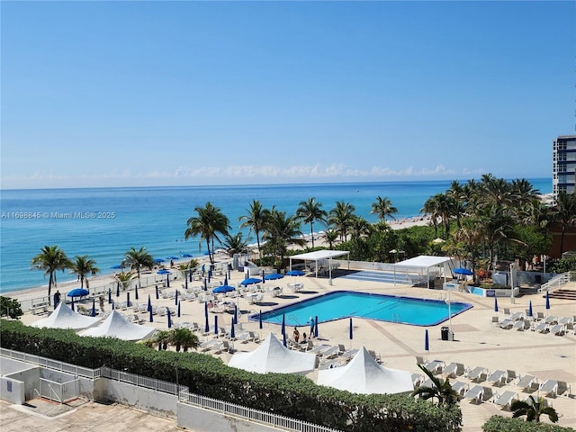 2030 S Ocean Dr Unit 604, Hallandale Beach, FL 33009 - community pool with a patio, fence, and a water view