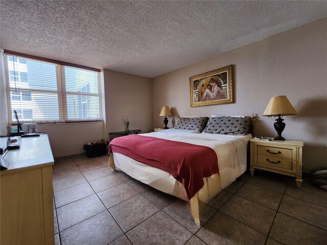 2030 S Ocean Dr Unit 604, Hallandale Beach, FL 33009 - bedroom featuring a textured ceiling and tile patterned floors