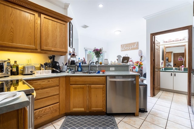 kitchen with dishwasher, light tile patterned floors, crown molding, and sink