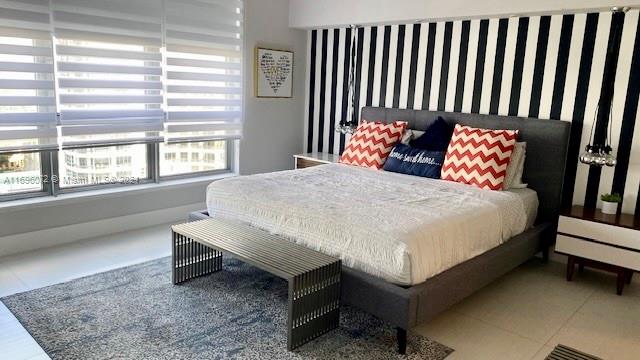 bedroom featuring tile patterned flooring