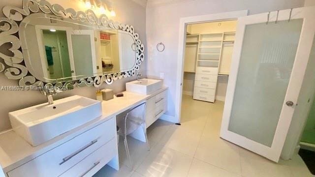 bathroom with vanity and tile patterned floors