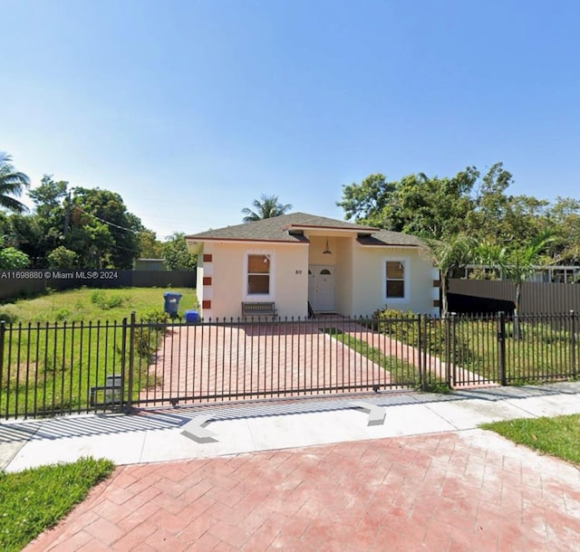 view of front of home with a front yard