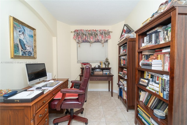 office space with light tile patterned flooring