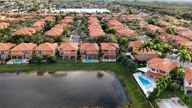 drone / aerial view featuring a water view