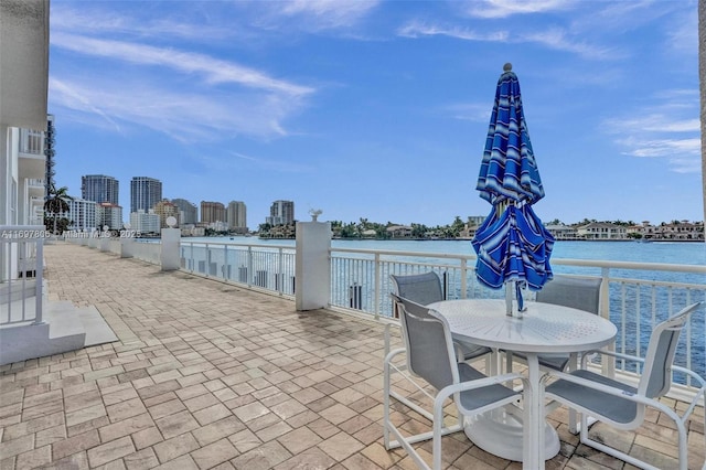 view of patio featuring a water view