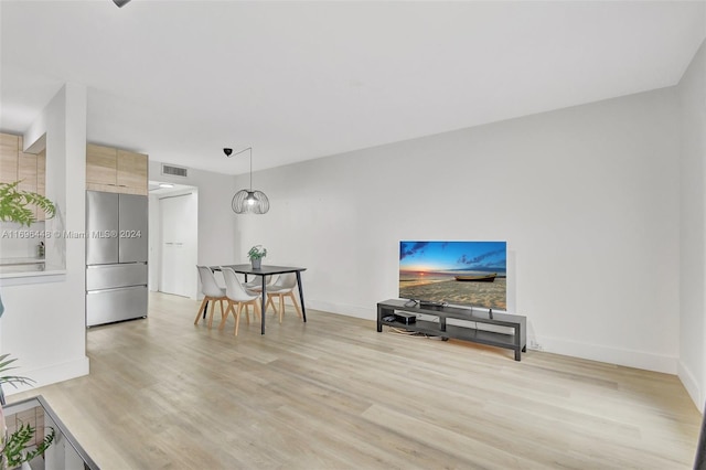 living room featuring light wood-type flooring