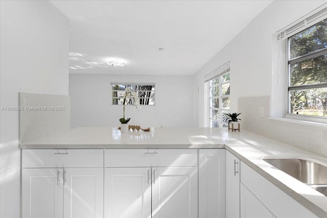 kitchen with white cabinets