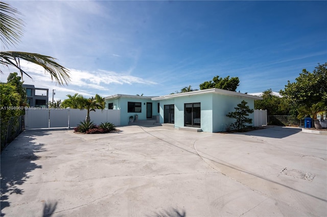 view of front of property featuring a patio