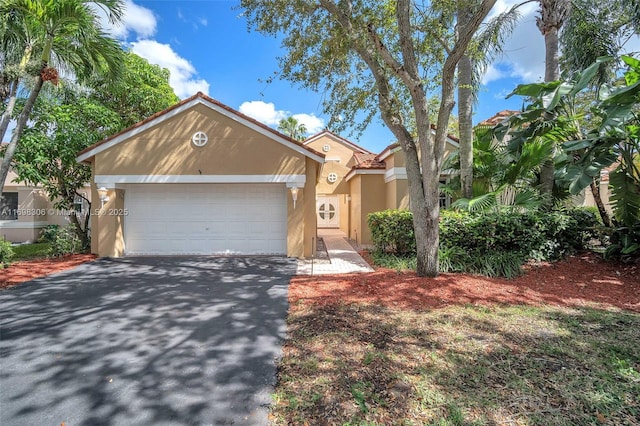 view of front of house with a garage