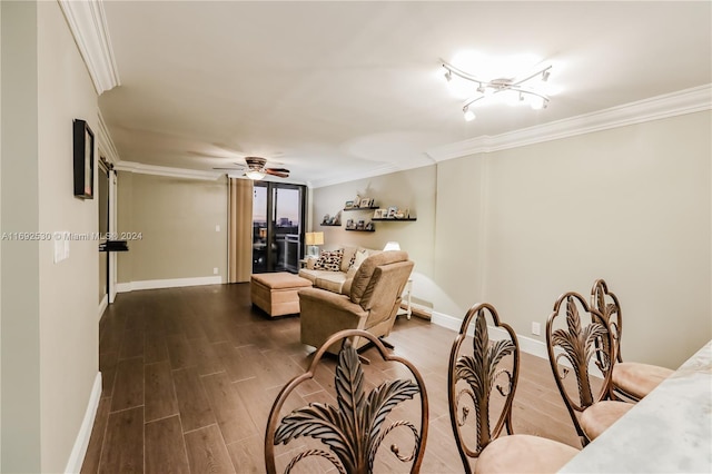 living room with dark hardwood / wood-style flooring, ceiling fan, and ornamental molding