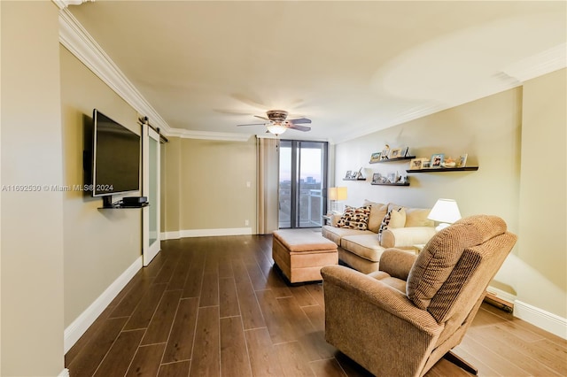 living room featuring ceiling fan, dark hardwood / wood-style floors, and ornamental molding