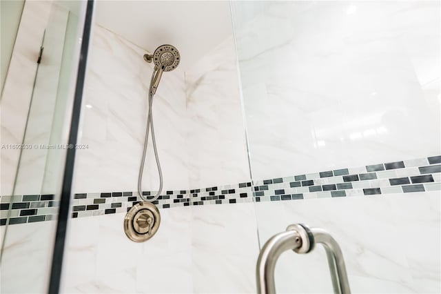 details with a tile shower