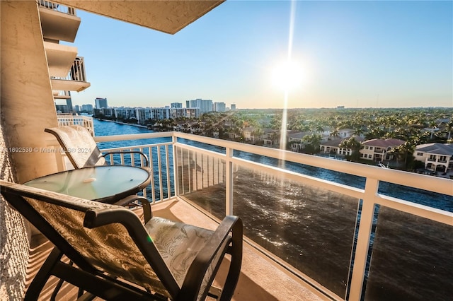 balcony featuring a water view