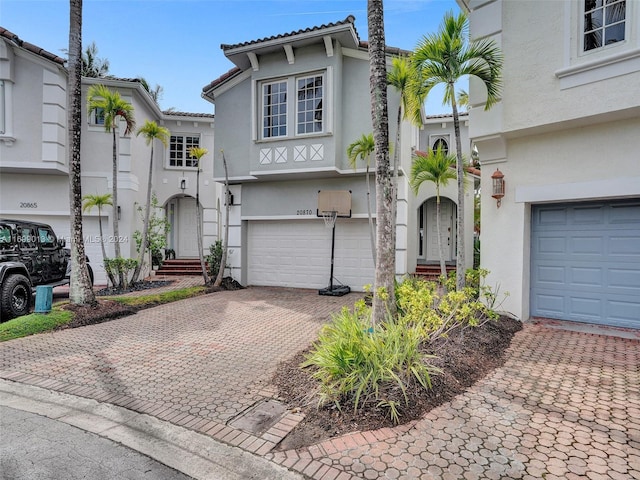 mediterranean / spanish-style home featuring a garage