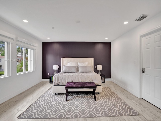 bedroom featuring light hardwood / wood-style flooring