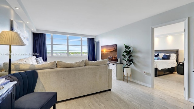 living room with light hardwood / wood-style flooring