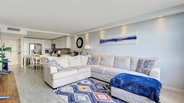 living room featuring light hardwood / wood-style floors