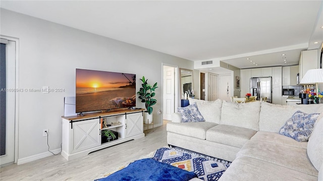 living room with light wood-type flooring