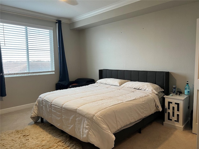 carpeted bedroom with ornamental molding