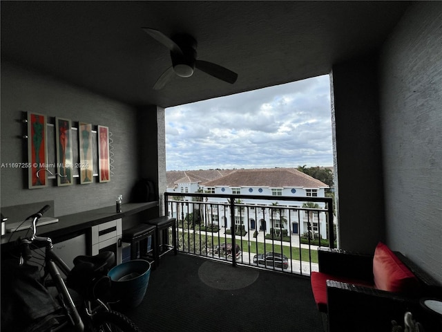 balcony featuring ceiling fan