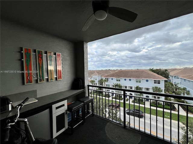 balcony featuring ceiling fan