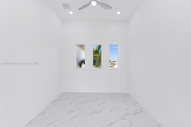 unfurnished room featuring ceiling fan