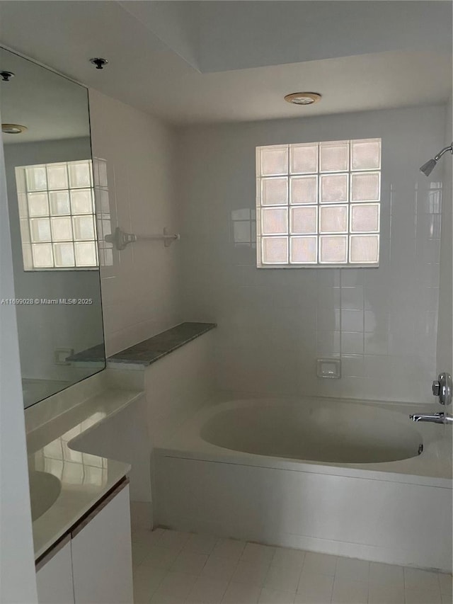 bathroom featuring vanity and bathtub / shower combination