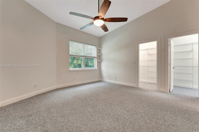 empty room featuring light carpet and ceiling fan