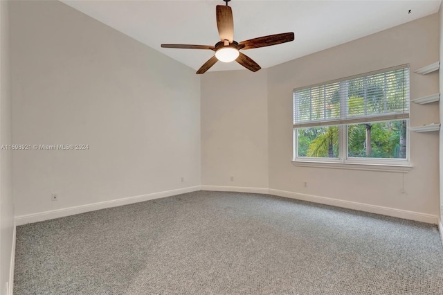 spare room with carpet flooring and ceiling fan