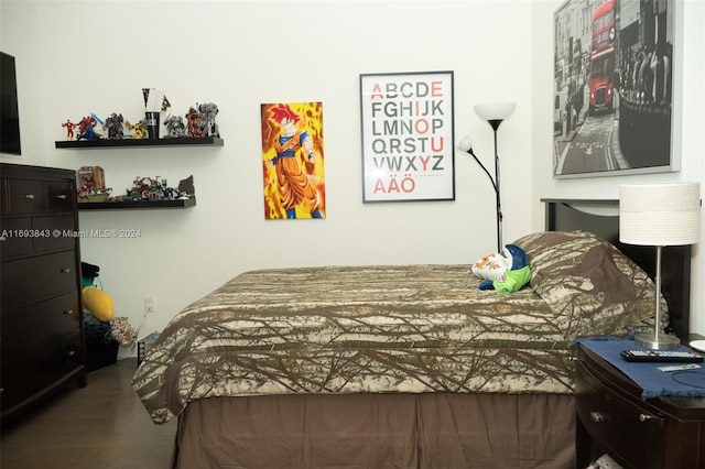 bedroom featuring hardwood / wood-style flooring