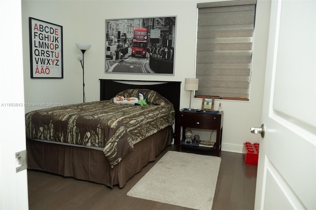 bedroom with wood-type flooring