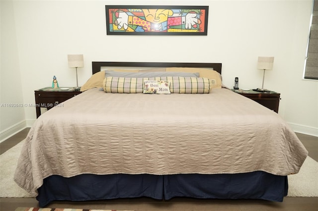 bedroom featuring hardwood / wood-style flooring