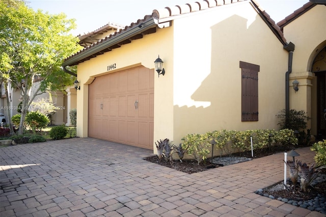 view of home's exterior with a garage