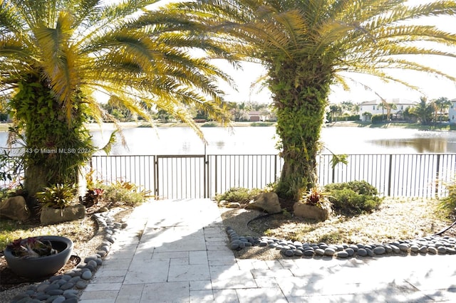 view of patio featuring a water view