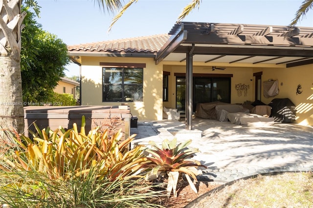 rear view of property with a patio