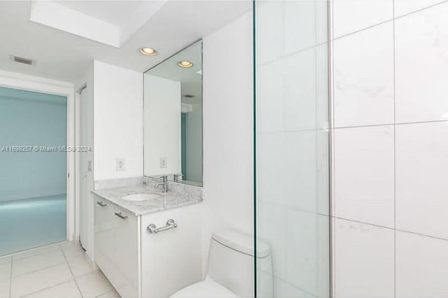 500 Brickell Ave Unit 2910, Miami, FL 33131 - bathroom featuring tile patterned flooring, vanity, and toilet